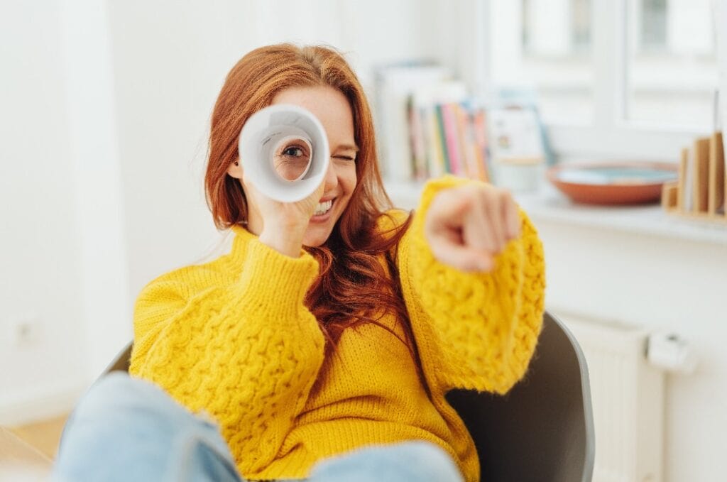 Playful young woman playing I Spy